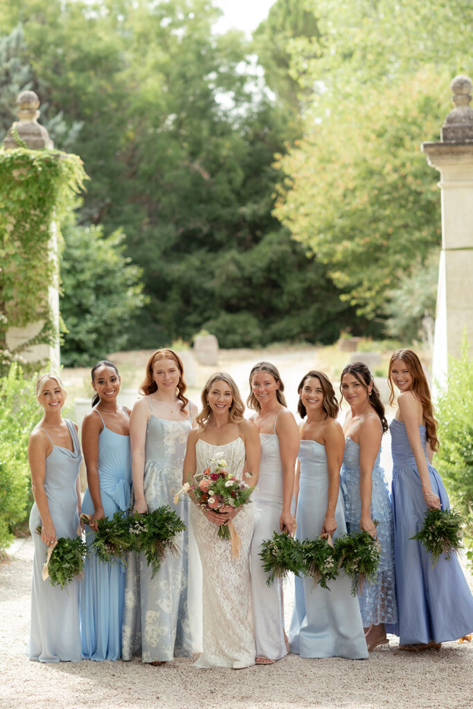 bridesmaids-makeup-and-hair-done-bouquet-bridesmaids-standing-together-wedding-in-provence-sea-bride-and-sun