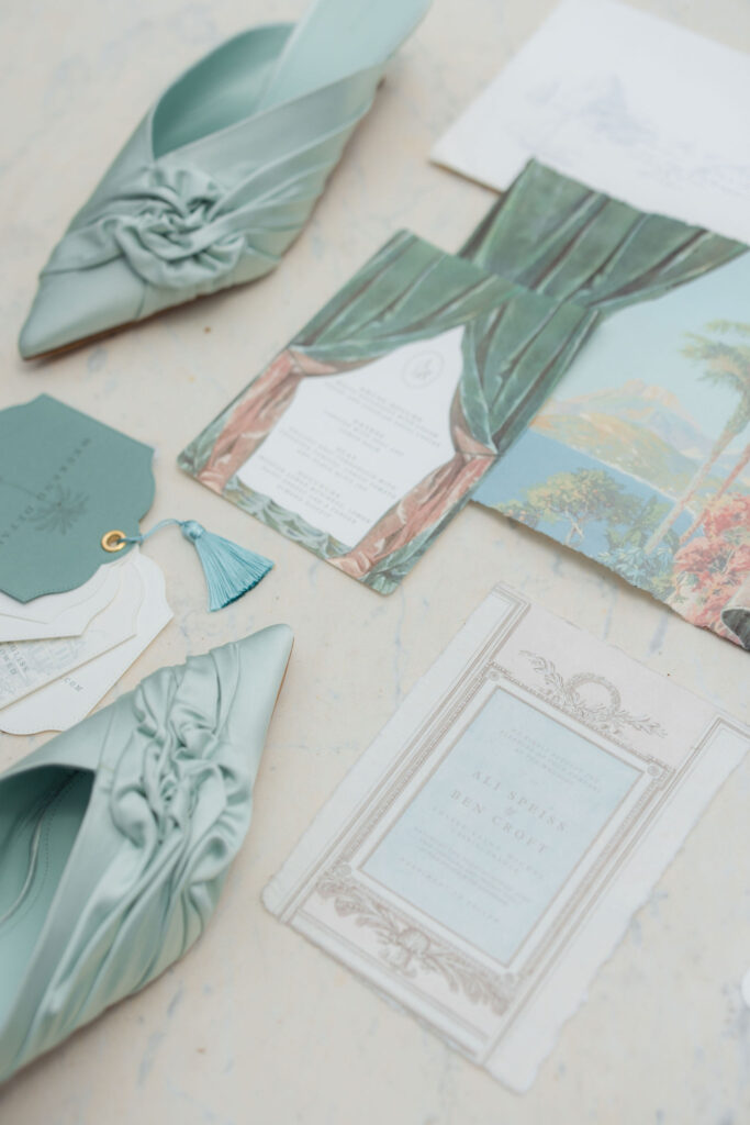 Flatlay-of-the-bride’s-personal-items-including-her-heels-and-wedding-invitations-wedding-in-provence-cassis-hotel-les-roches-blanches-Sea-bride-and-sun